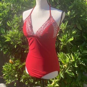 One piece suit by:  Isaac Mizrahi